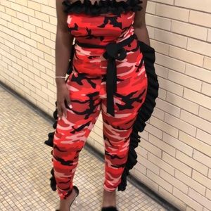 A red strapless jumpsuit